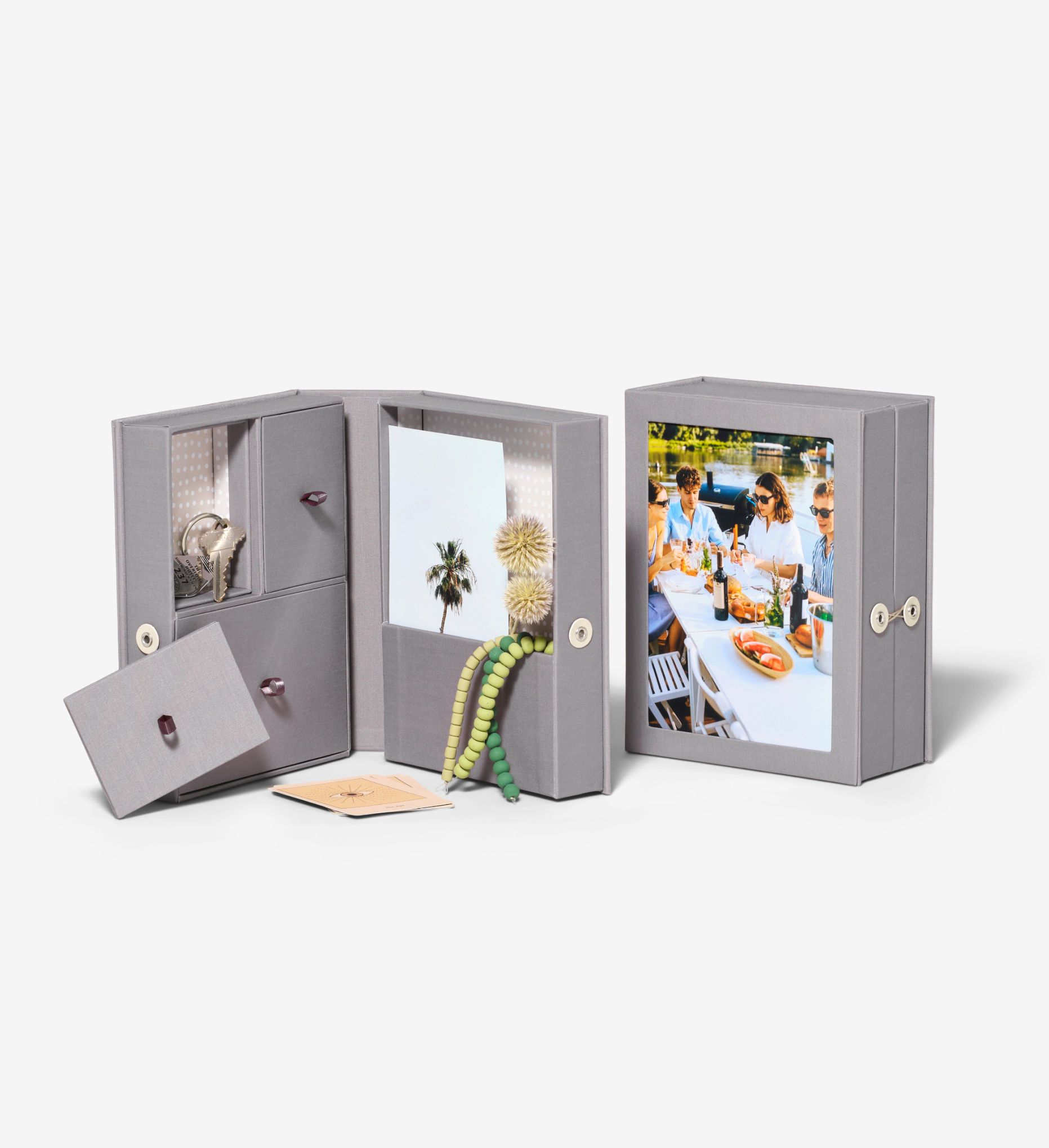 open slate travel story box, and closed slate travel story box next to each other.