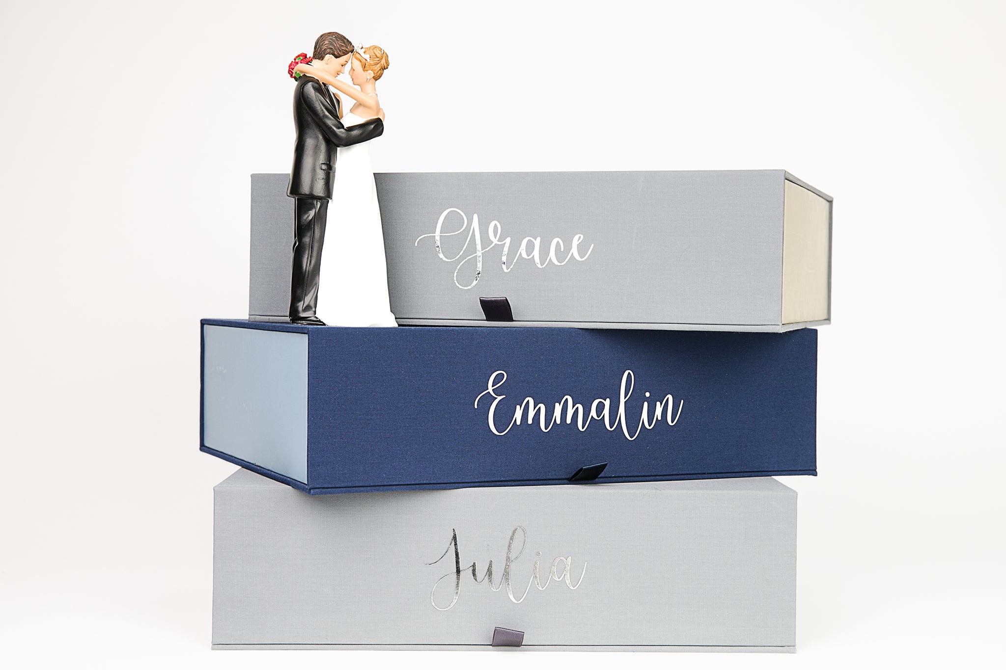 Blue and gray personalized organization boxes decorated with a couples figure.