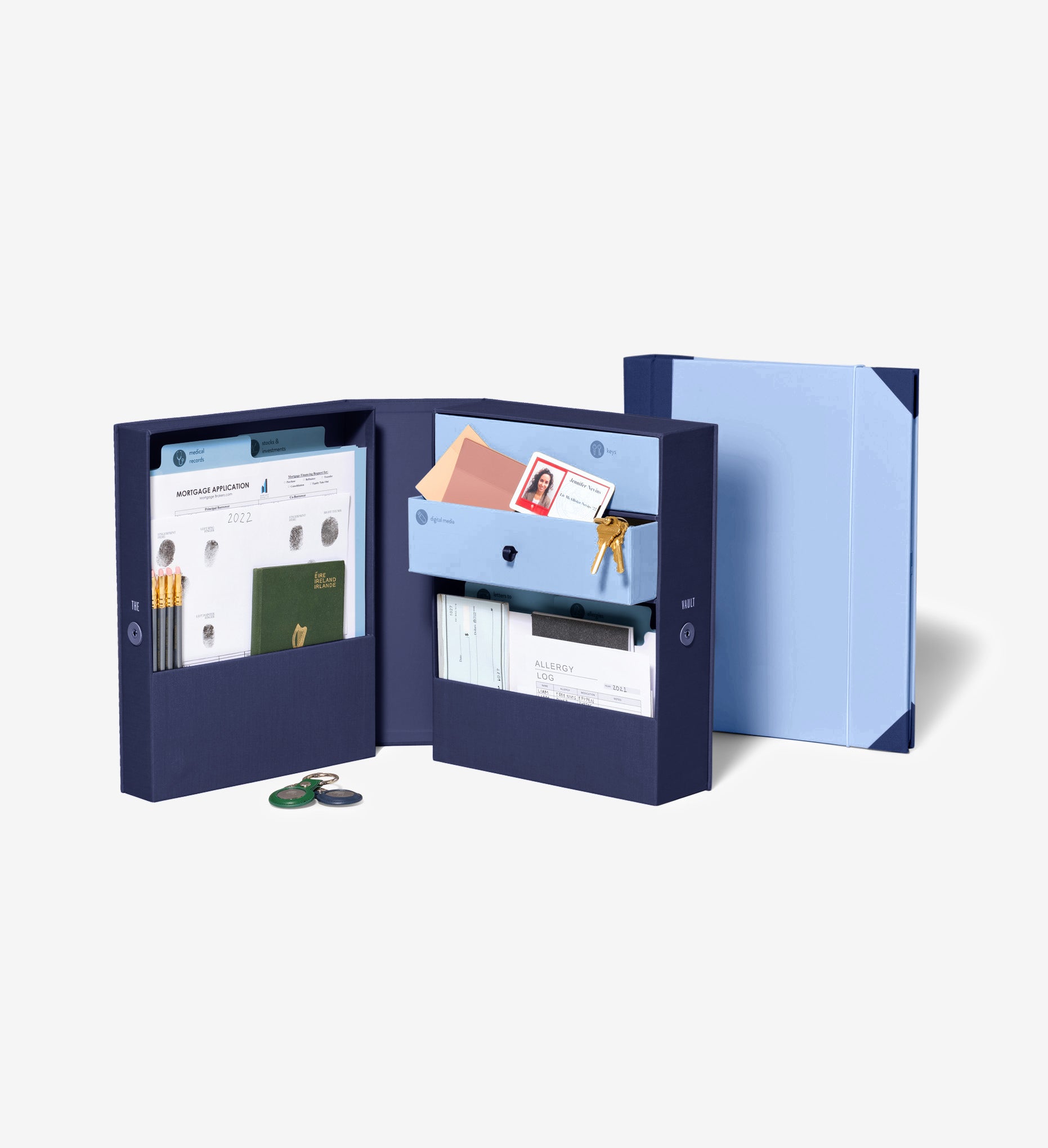 closed something blue family emergency binder behind an open something blue  family emergency vault