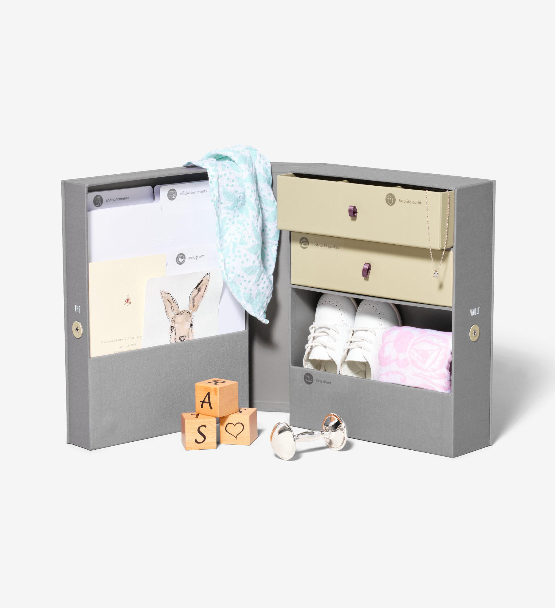 Open slate baby vault keepsake box with props.
