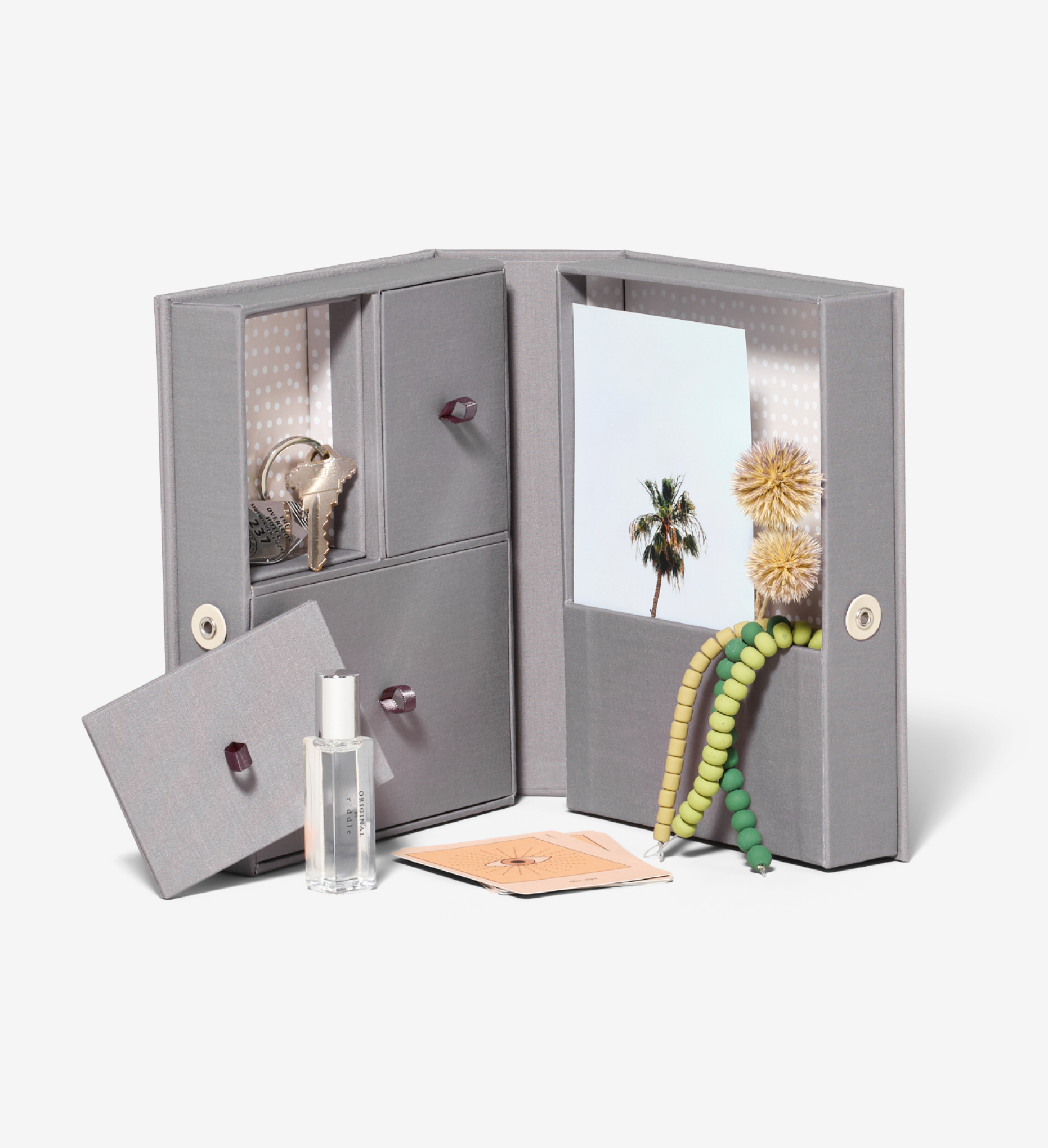 open slate travel story box with props.