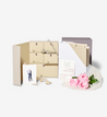 savor wedding deluxe keepsake box open with flowers, invitation and other props