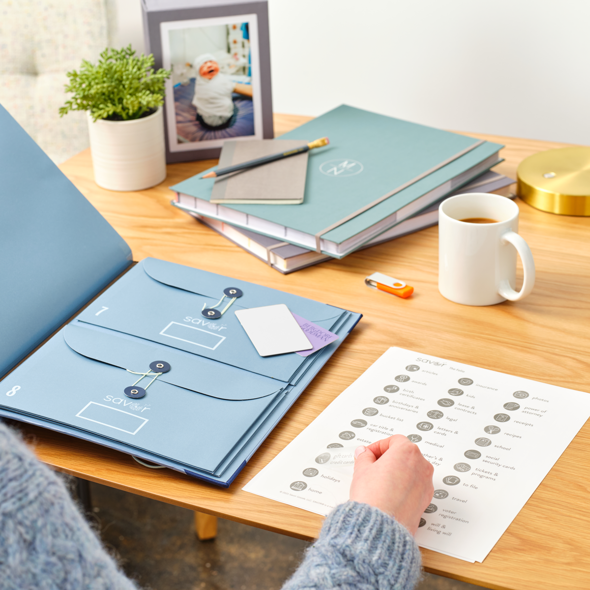 Savor folio document organizer open with labels, with fan folios in the background