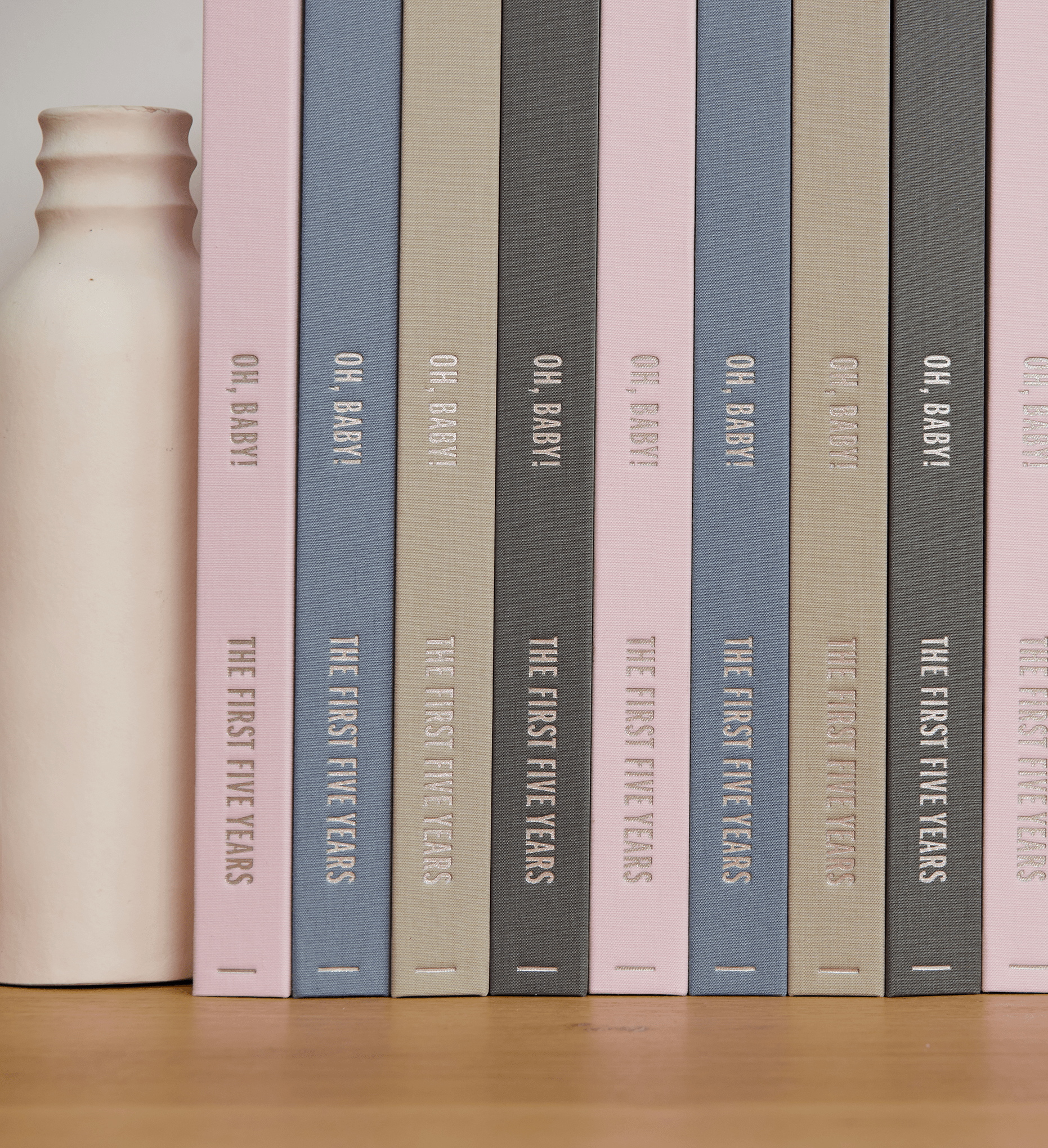 Savor closed baby books standing