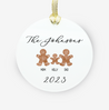 a christmas ornament personalized with laura and 3 gingerbread cookies