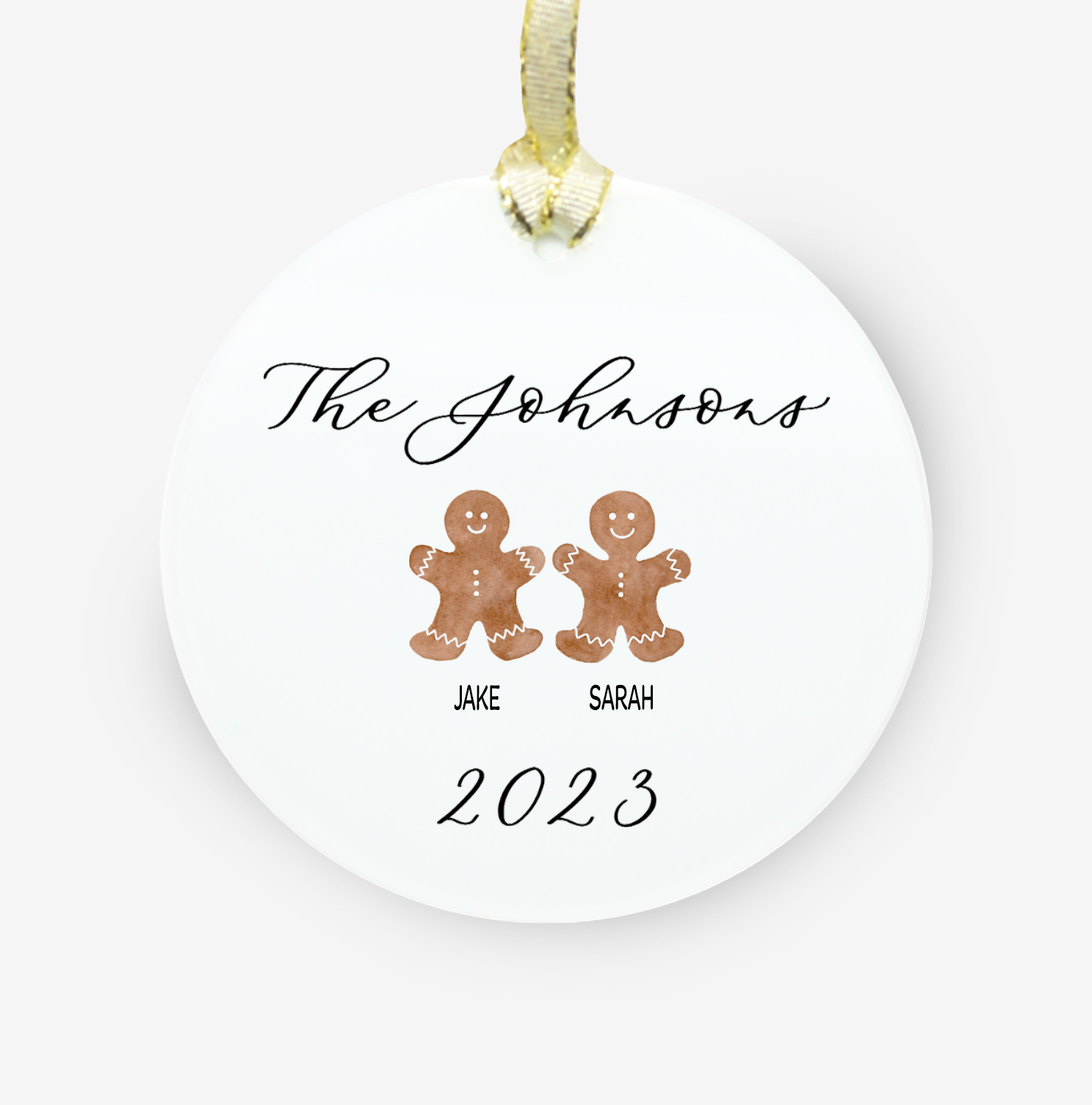 a christmas ornament personalized with laura and 2 gingerbread cookies