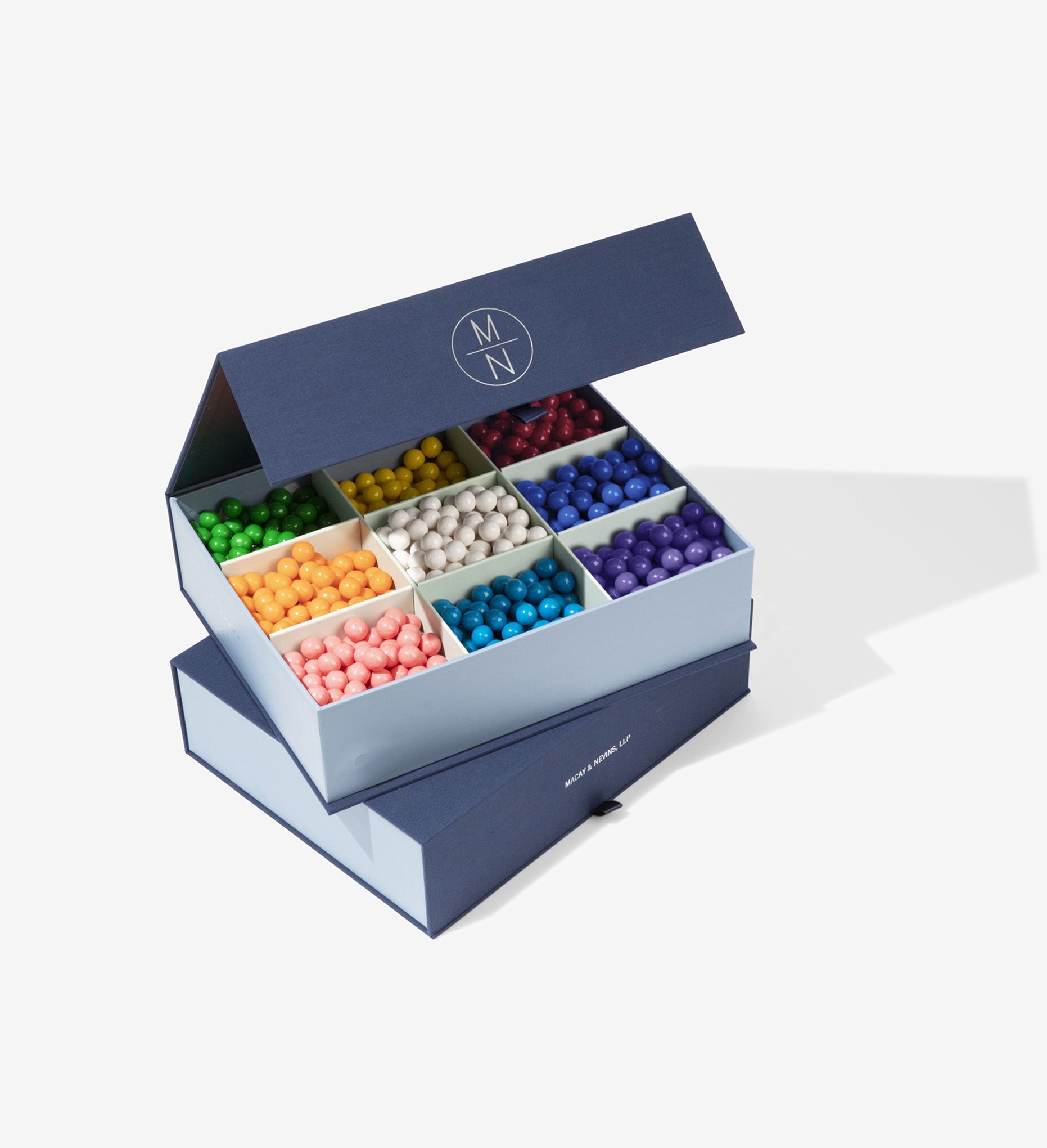 Open something blue safe deposit box with colorful candy and a closed one below. Both are personalized