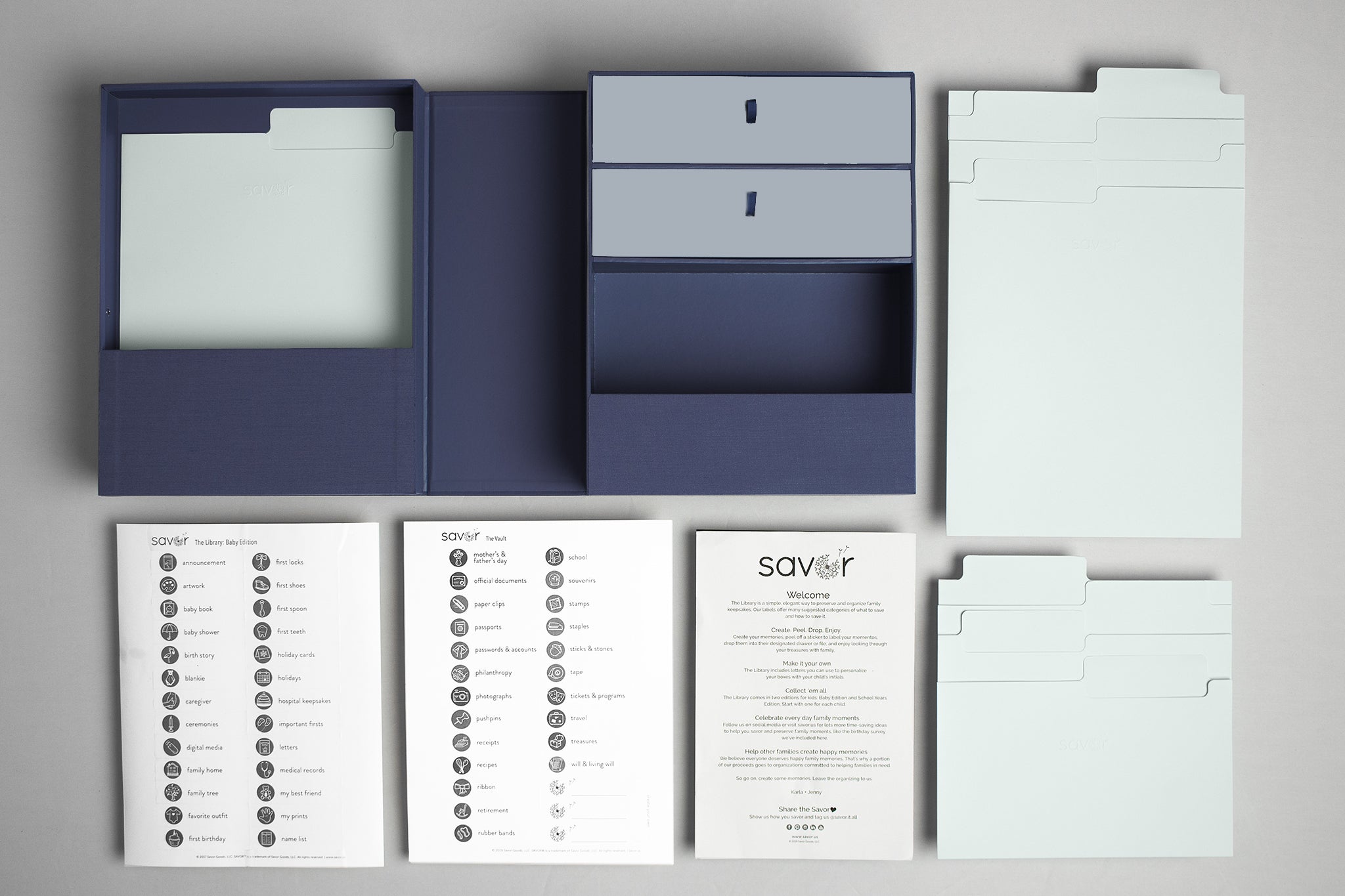 Birdseye, blue keepsake box laid out with folders and labels